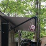 RV Awning Light Hanger with Lights in woods